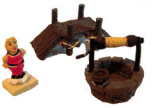 Gutemine mit Nudelholz im R�cken, ein Brunnen und eine Br�cke